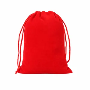 Demonstration of custom logo printing process on a red velvet drawstring jewelry gift bag