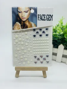 Detailed view of face gem stickers including pearls and heart-shaped crystals