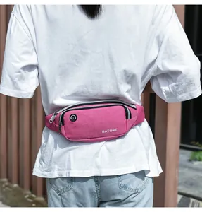 Pink compact lightweight sport waist bag worn on the waist during outdoor running