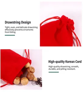Detailed view of red velvet jewelry bag showing secure drawstring and smooth cord