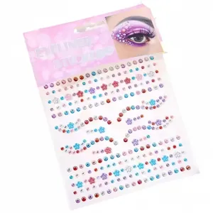 Detailed view of colorful face crystal stickers with flower and round rhinestone shapes