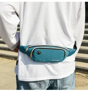 Detail shot of a lightweight blue waterproof sports waist bag worn during running