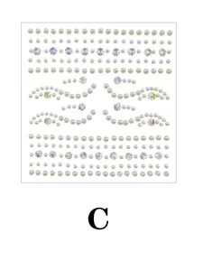 Detailed view of iridescent face rhinestones and pearls stickers for makeup