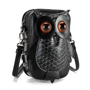 Creative punk owl-shaped crossbody bag with decorative eyes and textured finish.
