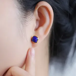 Elegant S925 silver gold plated stud earrings with a natural blue lapis lazuli