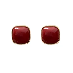Elegant S925 gold-plated square sugar cube stud earrings with red stone inlay