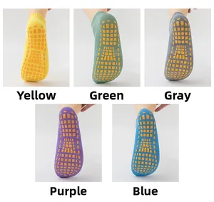 Detailed view of anti-slip yoga socks with orange rubber grips in five colors.