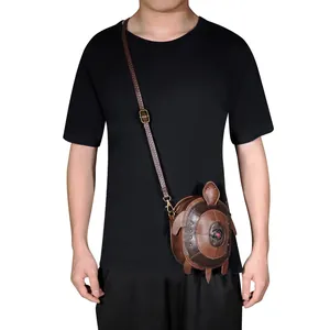 Creative turtle-shaped steampunk leather mini crossbody bag shown worn on a model