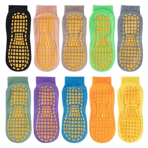 Set of ten colorful non-slip trampoline socks with grip soles for yoga and floor