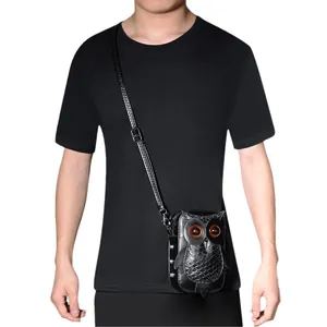 Minimalist punk style owl shaped crossbody bag with embossed scales and adjustable strap