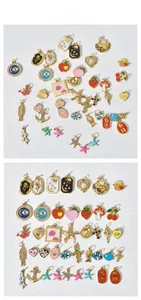 Assorted colorful enamel fruit and symbolic charms for creative DIY jewelry crafts.