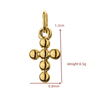 Detailed macro view of gold stainless steel bead cross pendant for DIY jewelry making