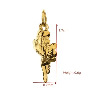 Detailed macro view of a golden stainless steel fruit pendant with size and weight marks