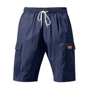 Detail view of navy blue breathable linen cargo shorts with white drawstring and pockets