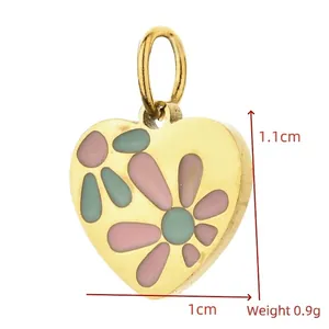 Detailed view of heart pendant with 1.1cm x 1cm dimensions and 0.9g weight.