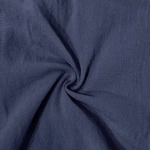 Macro detail of breathable dark navy linen fabric texture for men's casual shorts