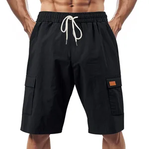 Detailed view of men's black breathable linen cargo shorts with elastic drawstring waistband