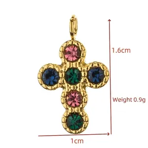 Detailed dimension view of a gold cross pendant decorated with colorful rhinestones.