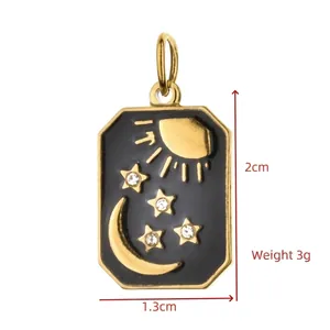 Detailed view of gold-plated celestial enamel pendant with sun moon and stars