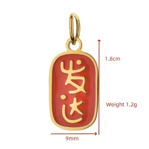 Detail view of red enamel prosperity charm with 1.8cm height and 1.2g weight
