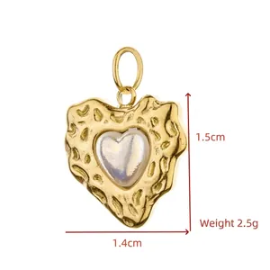 Detailed macro shot of a gold textured heart pendant with 1.5cm x 1.4cm size info.