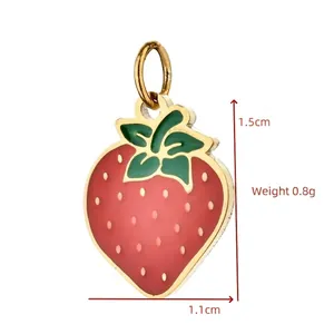 Close-up of strawberry pendant with height 1.5cm and width 1.1cm measurements