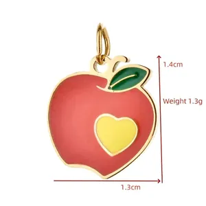 Detailed macro shot of stainless steel apple enamel charm showing dimensions and weight.