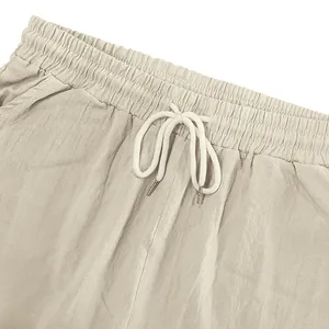 Close-up detail of breathable linen men's shorts with elastic drawstring waistband