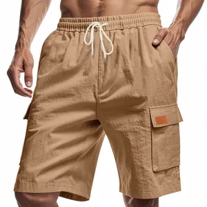 Detail view of men's breathable khaki cargo shorts featuring a drawstring waist and pocket.
