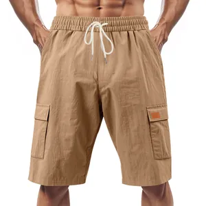 Detailed close-up view of men's breathable khaki linen cargo shorts with drawstring waistband.