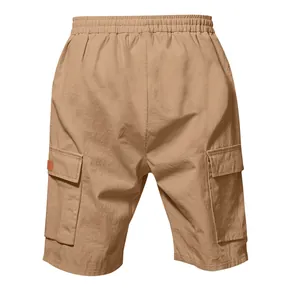 Detail view of khaki cargo shorts showing the elastic waistband and side pockets