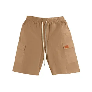 Detail view of men's breathable linen cargo shorts featuring elastic drawstring waist