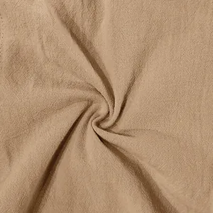 Close-up macro detail showing breathable khaki linen fabric texture for men's casual beach shorts