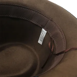 Close-up of brown suede jazz hat interior showing polyester care label and sweatband