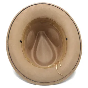 Interior view of a vintage brown suede fedora showing the inner band detail