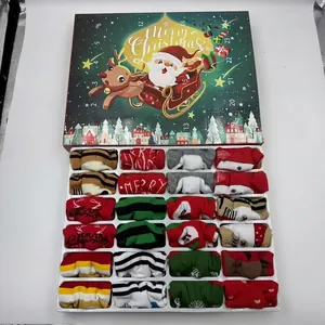 Detailed view of kids Christmas advent calendar featuring 24 pairs of festive holiday socks