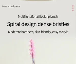 Macro detail of a pink spiral disposable eyelash brush head with soft bristles