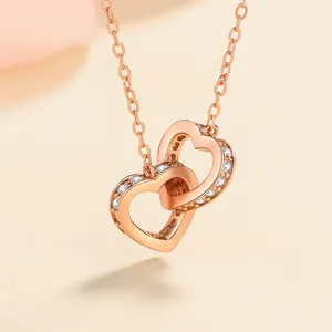 Rose gold S925 sterling silver necklace featuring two interlocking hearts with moissanite
