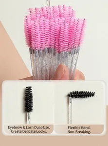 Macro detail of disposable eyelash brush with glitter crystal rod and adjustable head