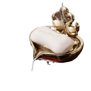 Elegant golden swan ceramic soap dish with creative drainage for luxury bathroom decor
