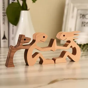 Close-up detail of creative wooden figurines depicting humans and a dog in Nordic style