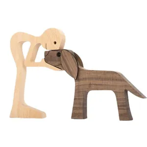 Minimalist handcrafted Nordic style wooden figurine of a person and dog for desktop decor.