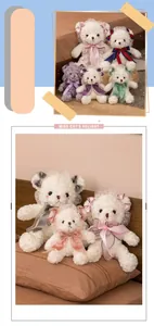 Cute Lolita style teddy bear plush doll with lace ribbons on a cozy bed setting