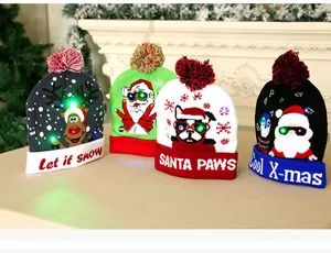 Detailed group view of four colorful LED luminous Christmas knitted beanies with holiday motifs