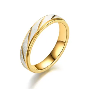 Two-tone gold and silver ring with diamond-cut diagonal textures for couples