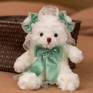 Adorable white Lolita style teddy bear plush toy with lace headpiece and green ribbons