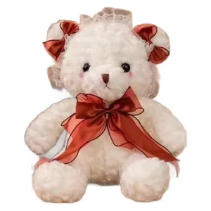 White Lolita style teddy bear plush toy with red satin bows and lace detailing
