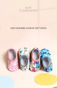 Detailed macro view showing colorful cartoon patterns on non-slip baby floor socks
