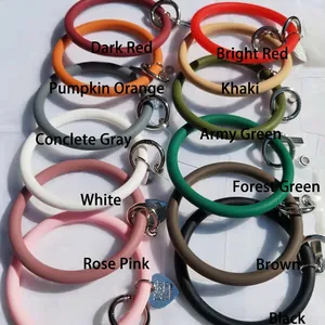 Colorful multi-functional silicone wristlet keyrings and phone straps in various shades