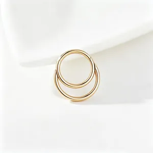 Detailed view of high-quality gold titanium steel double rings for ear or nose piercing